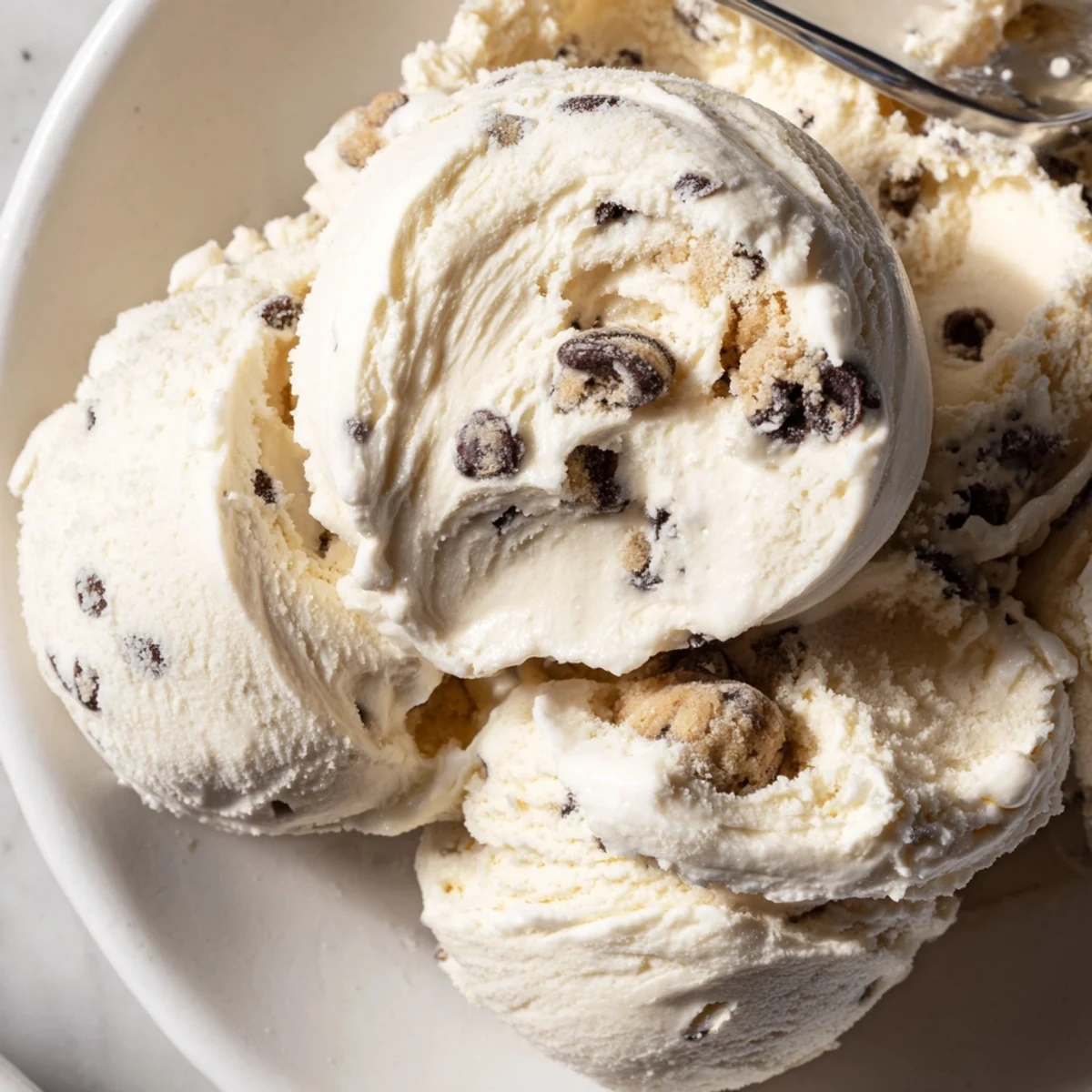 Creamy cottage cheese ice cream with edible cookie dough for a delightful treat.