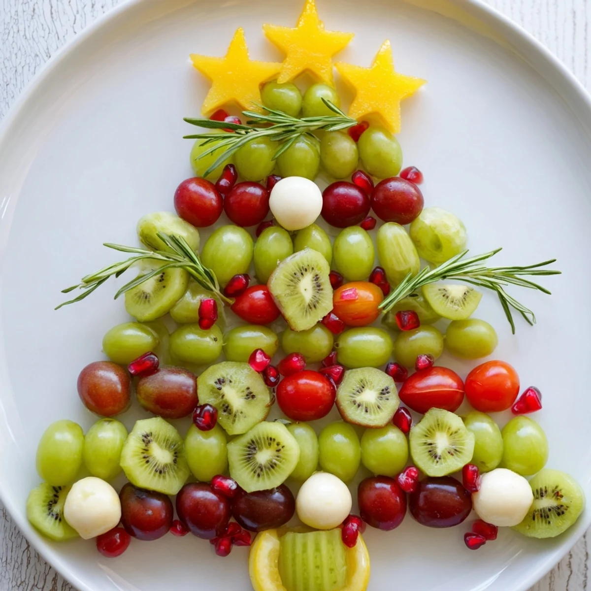 This Christmas Tree Triangle Board appetizer shows a beautifully arranged vegetarian delight, perfect for seasonal gatherings.