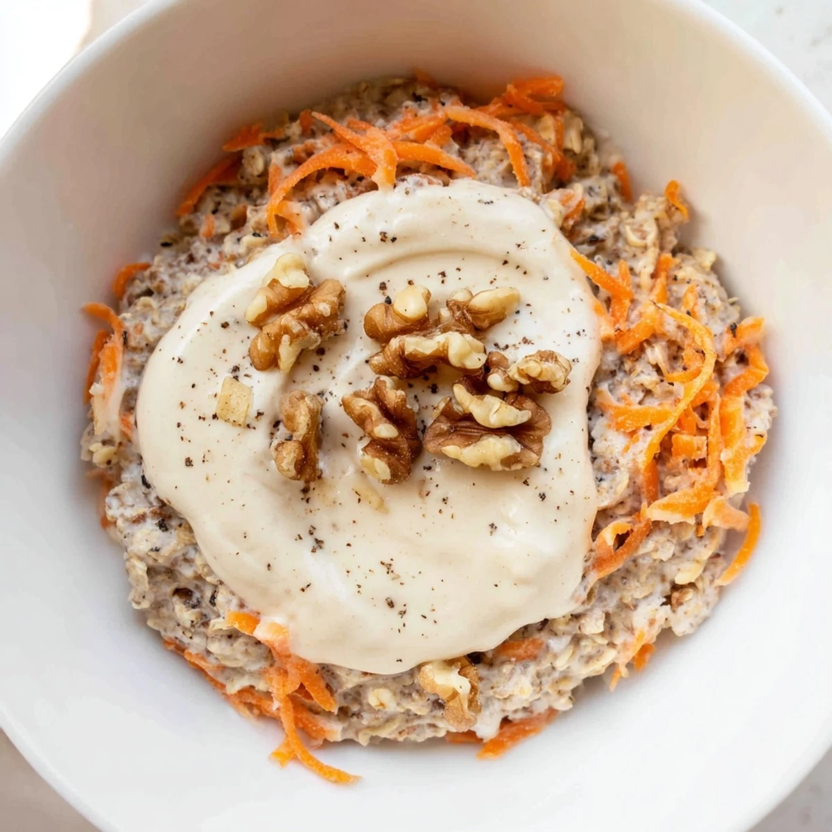 Creamy Carrot Cake Overnight Oats, layered with grated carrots and warm spices, ready to chill overnight.