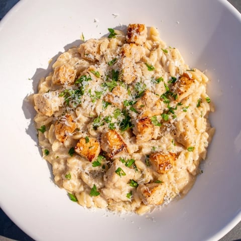 One-Pot Cajun Chicken Alfredo Orzo, a creamy, savory skillet meal with tender chicken and fluffy orzo.