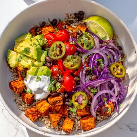 Vibrant Sweet Potato Taco Bowls showcasing roasted sweet potatoes and fresh toppings, ready to enjoy.
