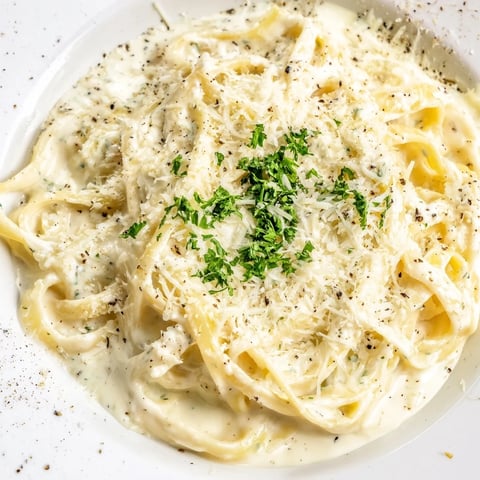 Creamy cottage cheese Alfredo sauce, ready to pour over pasta, rich and velvety smooth, delicious flavor.