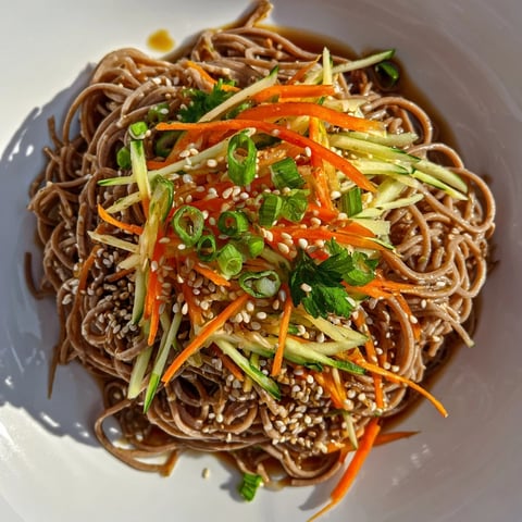 Chilled Noodle Lunch Cups: Fresh, colorful noodles with crisp veggies and savory sauce, perfect for a quick lunch.