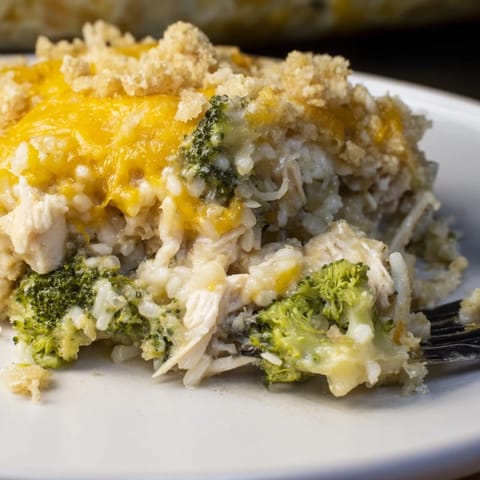 Mouthwatering broccoli, rice, cheese, and chicken casserole topped with golden melted cheddar.  