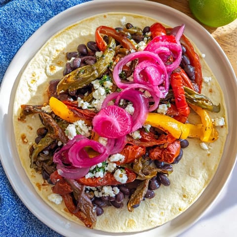 A beautifully arranged Desert Bloom Cactus Taco Board, ready for gathering, loaded with various toppings.