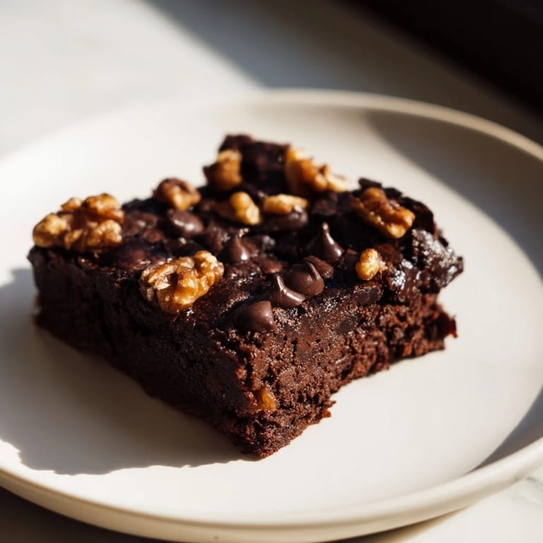 These gluten-free sweet potato brownies are ready to serve, with a soft, moist texture, perfect for dessert.