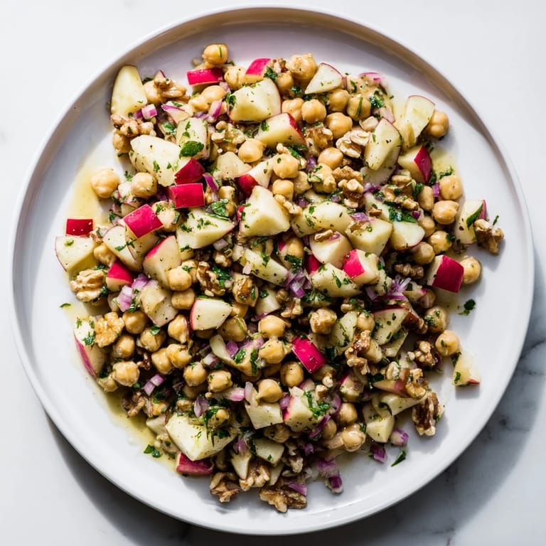 A close-up view of the delicious Fall Harvest Apple and Chickpea Salad, showcasing its fresh ingredients.